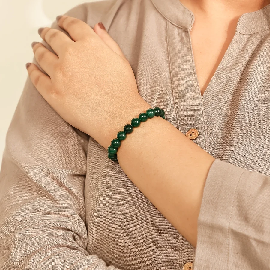 Green Jade Bracelet with close hand